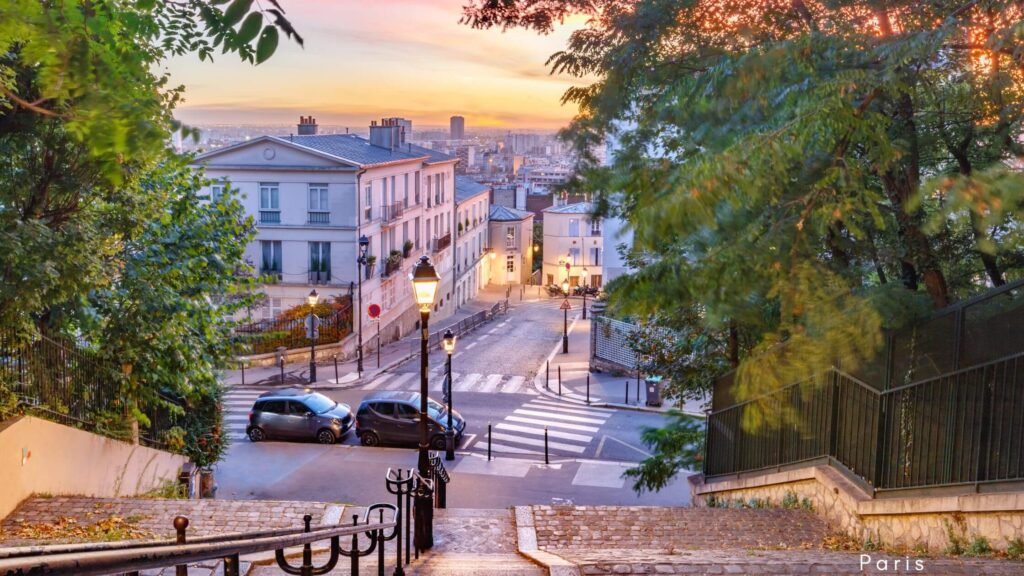 Charming street in Montmartre, Paris. Montmartre neighborhood is known for its cobblestone paths and vibrant art scene