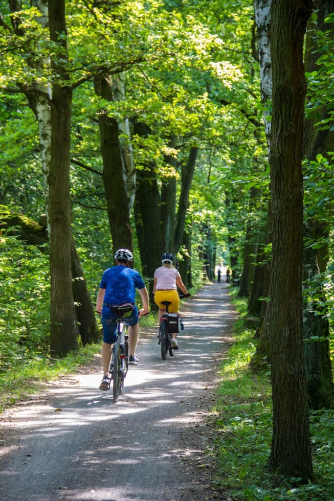 Expat couple on a bike ride through picturesque German countryside