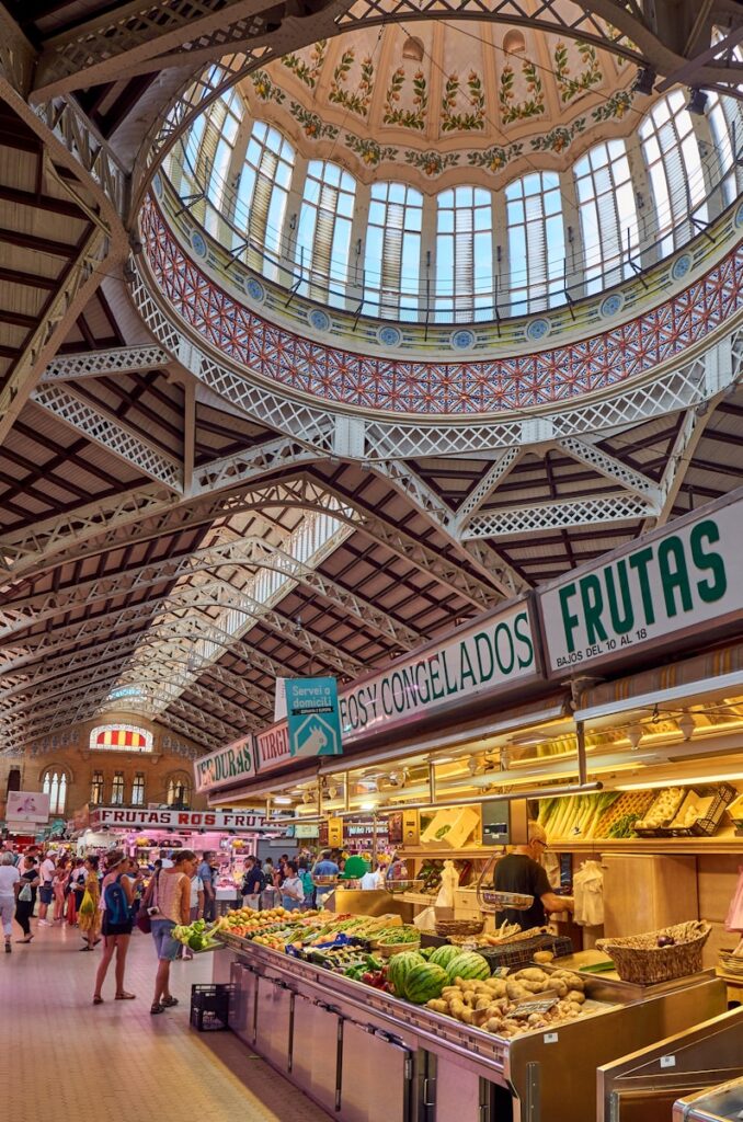 Vibrant scene at Mercado Central, an iconic indoor food market in Valencia, a must-visit for those relocating to Valencia