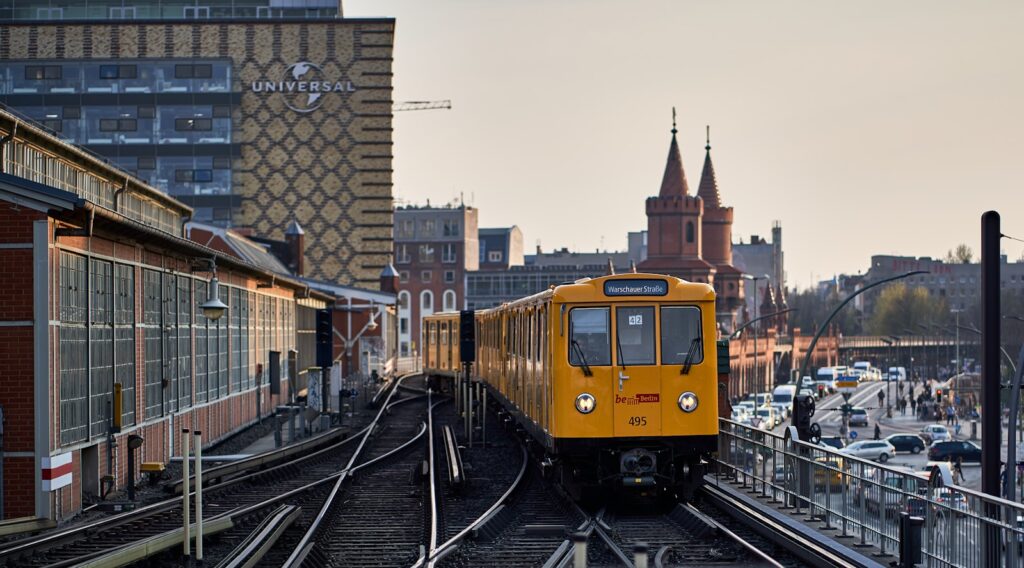 A view of a train entering Kreuzberg showcasing the city's efficient public transportation syste,