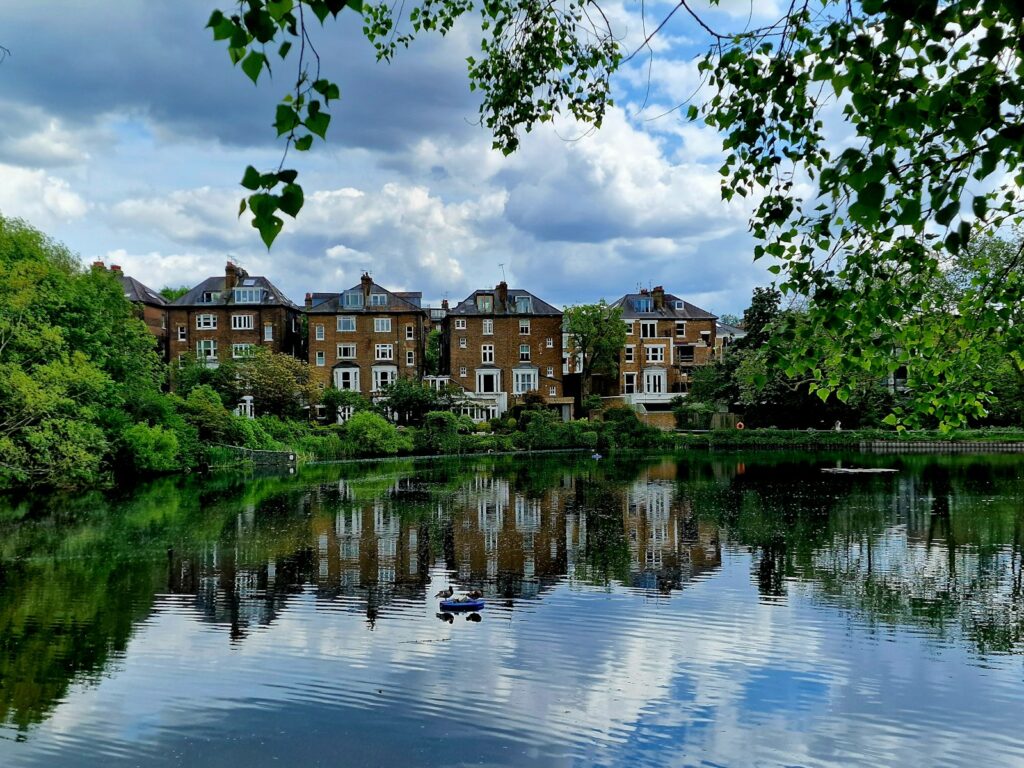 Image of Hampstead Heath showcasing its lush greenery, serene ponds